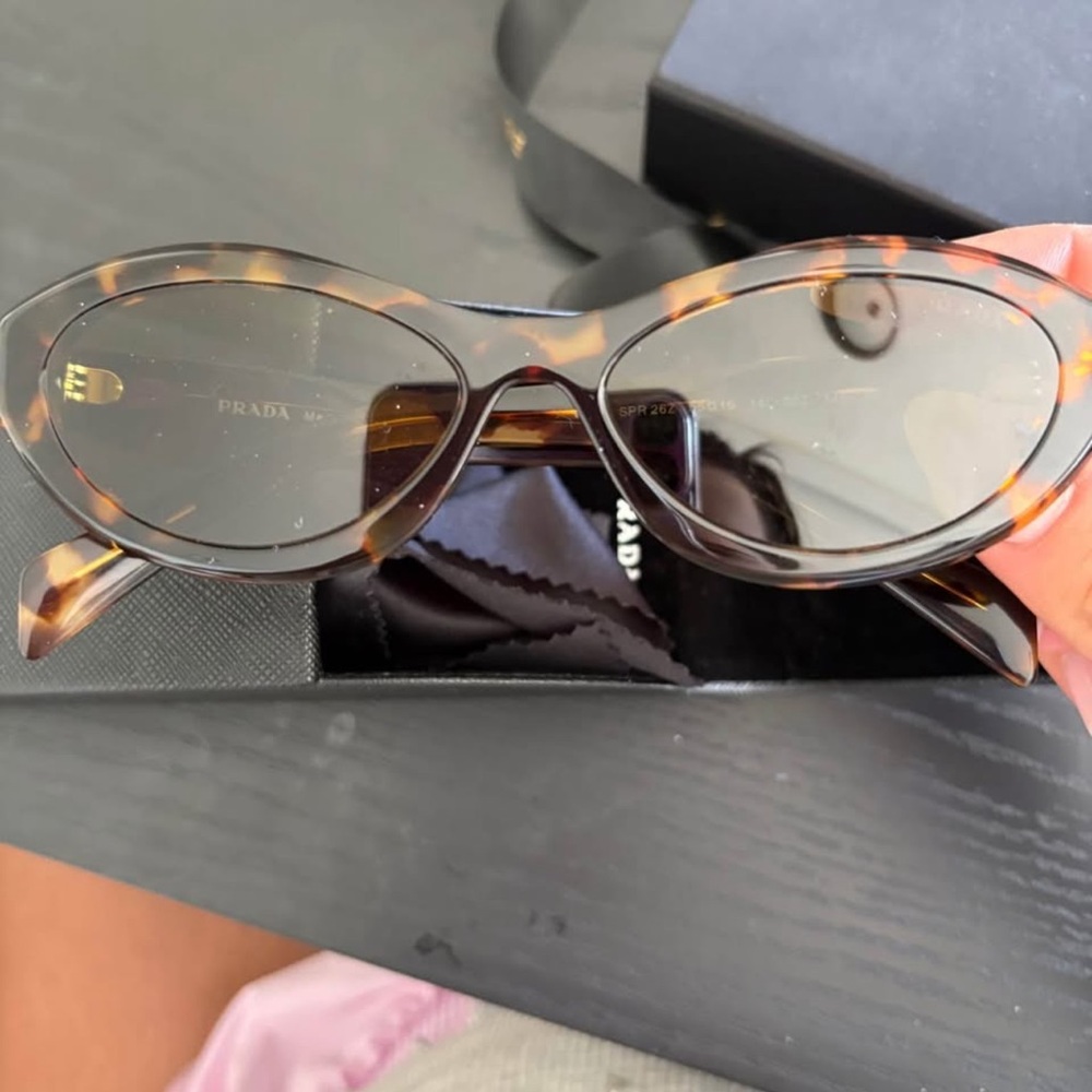 Prada Brown Sunglasses Sleek Cat-Eye Design